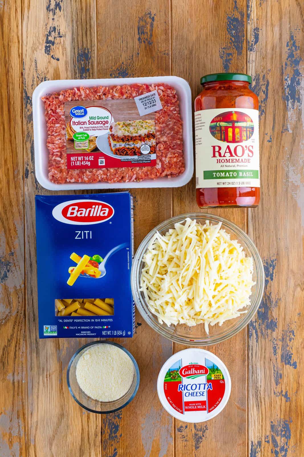 Ziti pasta noodles, Italian ground sausage, pasta sauce, Grated Parmesan cheese, ricotta cheese, and shredded mozzarella cheese.