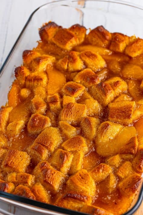 Fresh baked Peach Pie bubble up in a baking dish without the glaze.