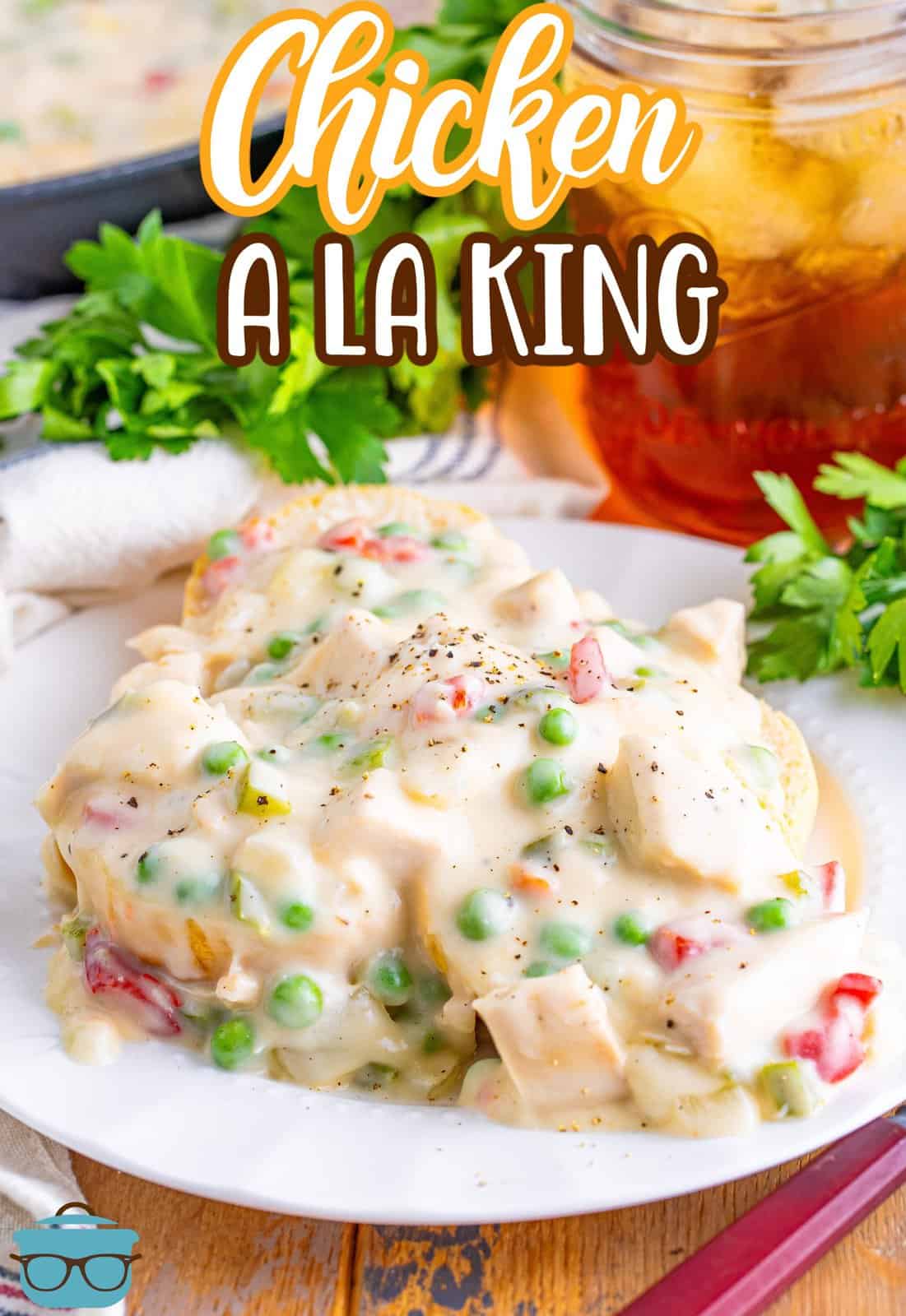 A white plate with a large serving of Chicken a la King.