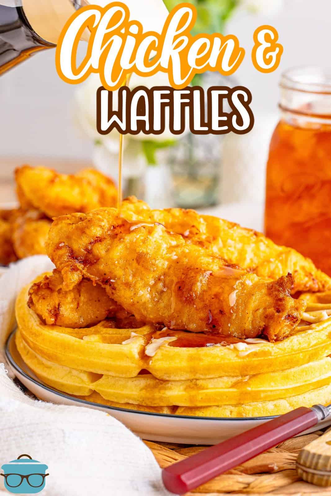 A plate with thick Buttermilk Waffles and Chicken.