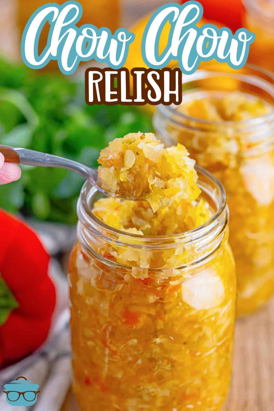 A spoon scooping out some Chow Chow Relish from a Mason jar.