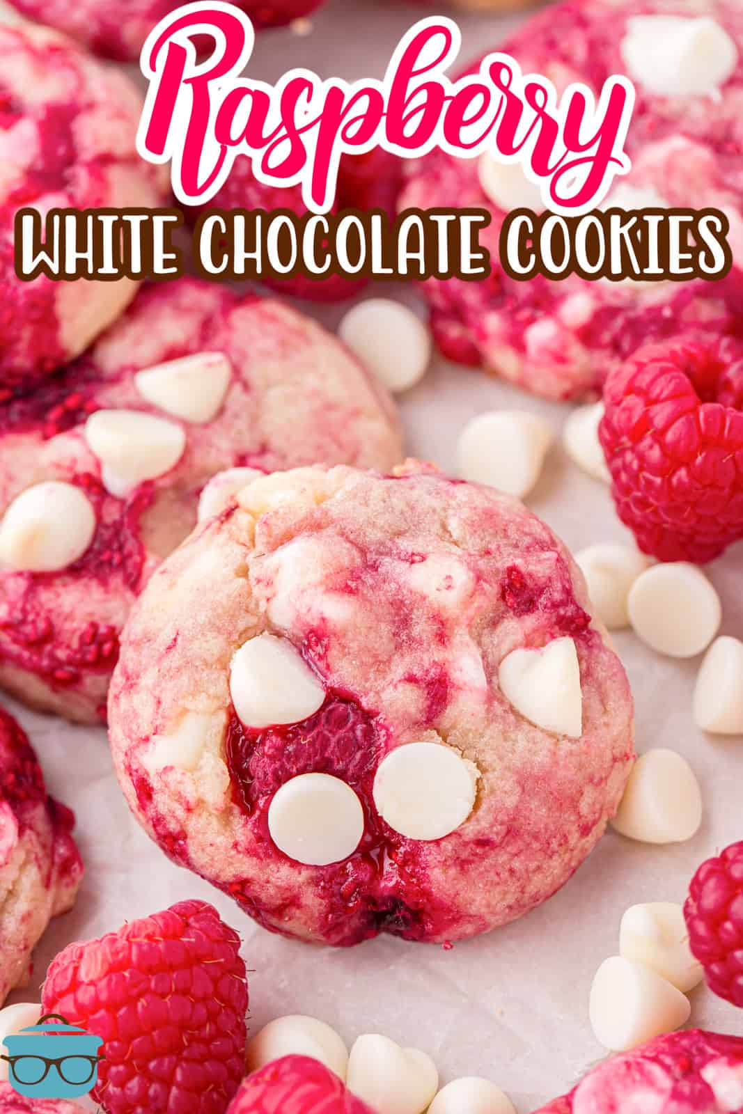 A few Raspberry White Chocolate Cookies in a pile on a plate.