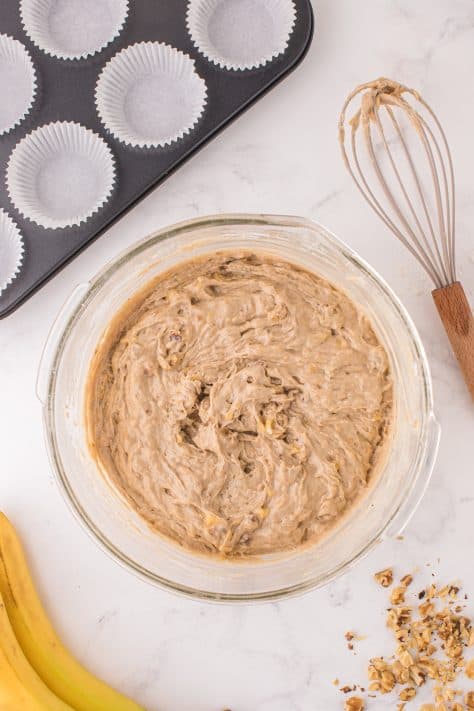 Banana Nut Cake Mix Muffin batter in a glass bowl.
