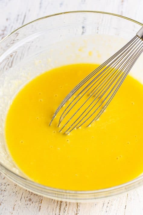 Flour, sugar, buttermilk, melted butter, eggs, lemon juice, and vanilla in a mixing bowl.