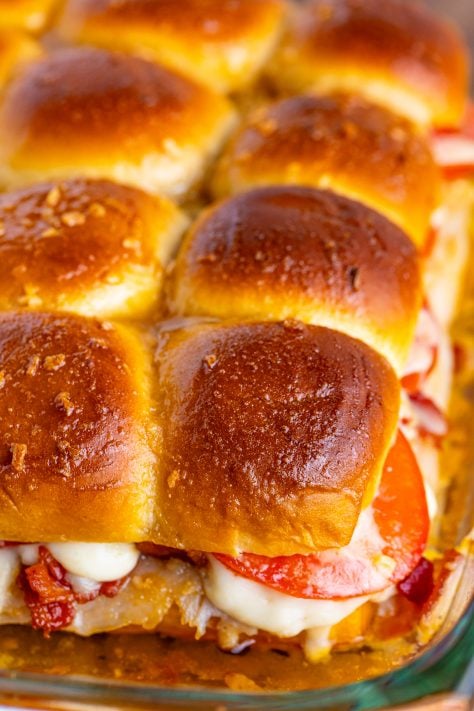 Fresh baked Kentucky Hot Brown Sliders in a dish.
