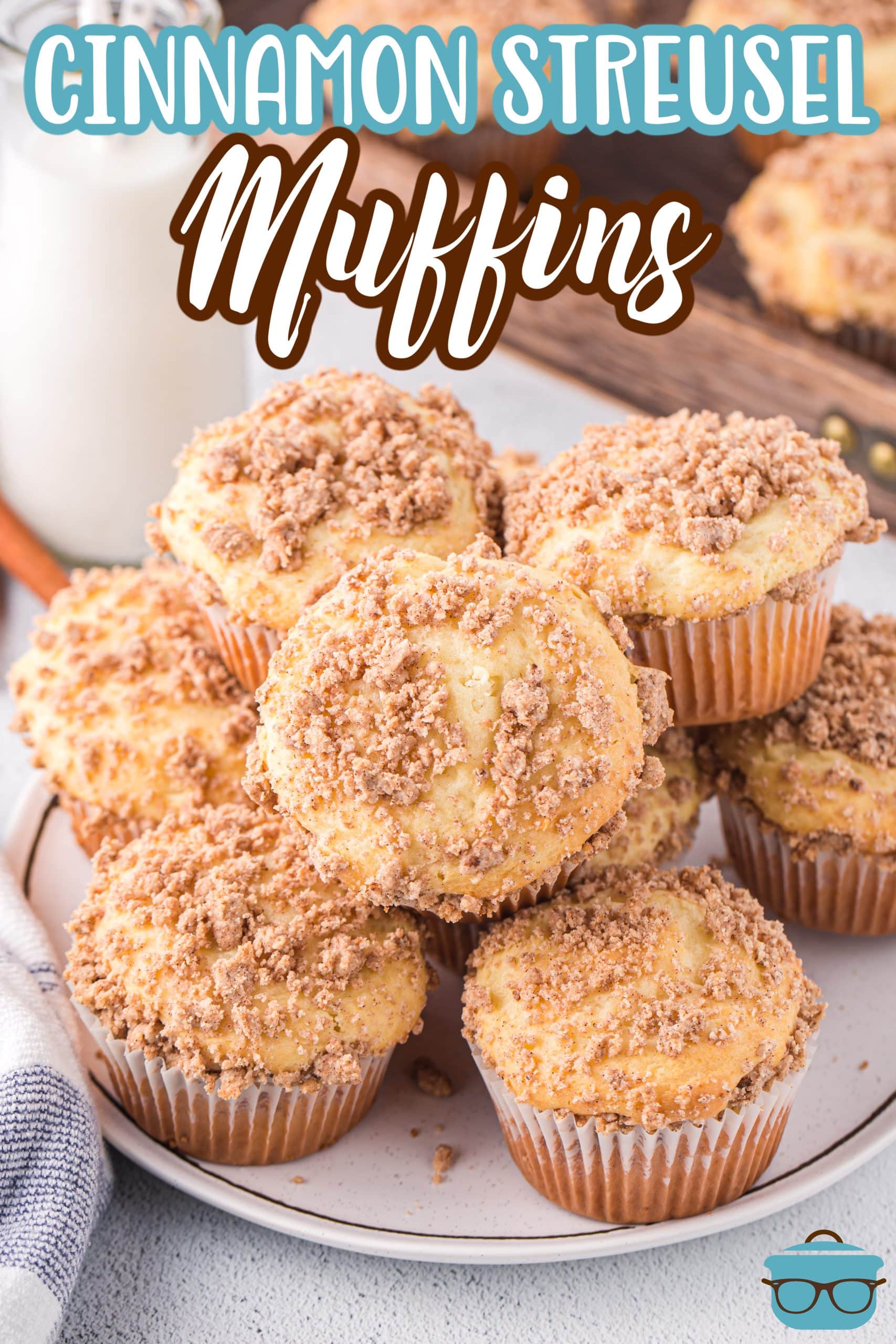 A plate of Cinnamon Streusel Cale Mix Muffins with the perfect topping.