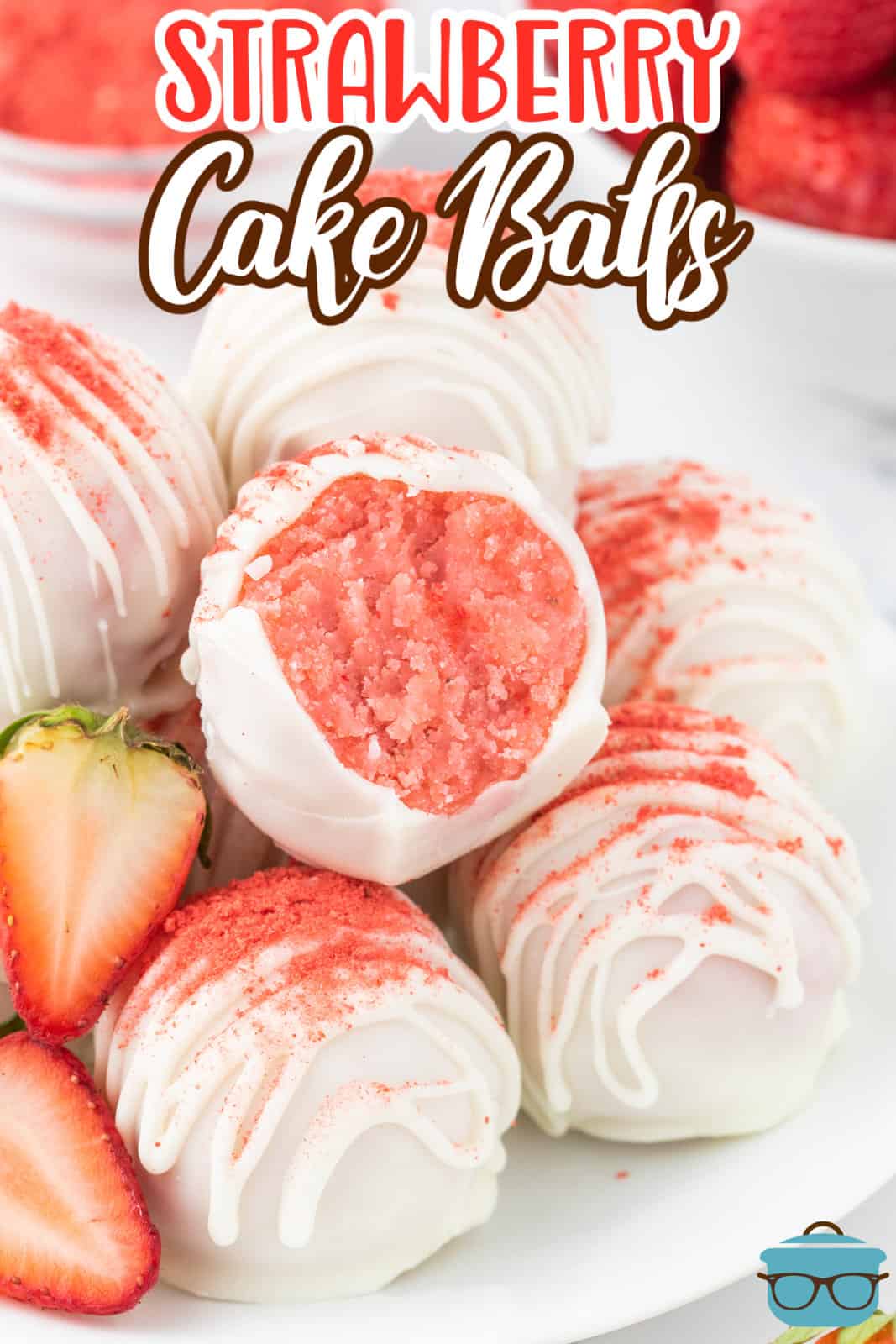 A pile of a few Strawberry Cake Balls on a plate.