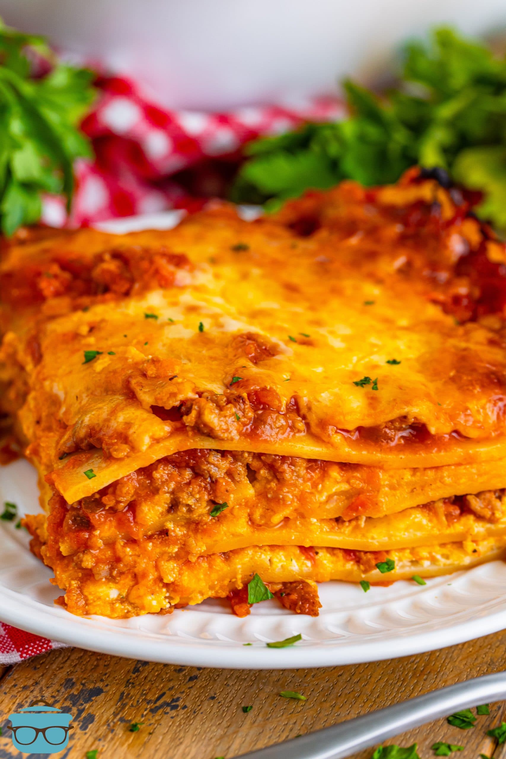 A plate with a serving of Lasagna for Two.