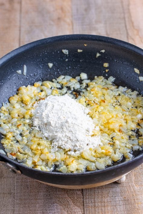 Flour, butter, and onions in a skillet.
