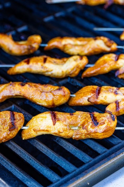 Grilled chicken cooking on the grill.