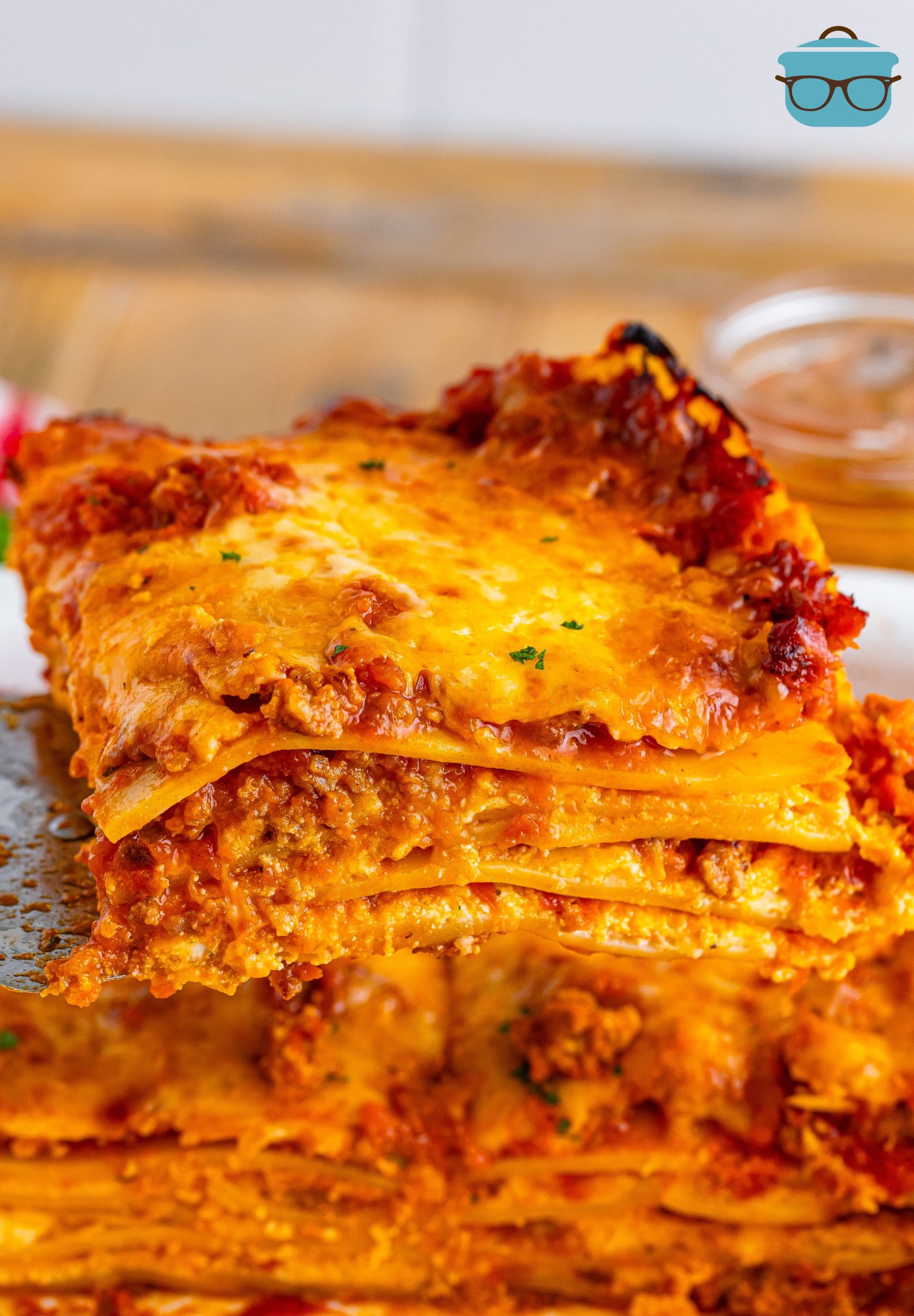 A serving of Lasagna above the rest.