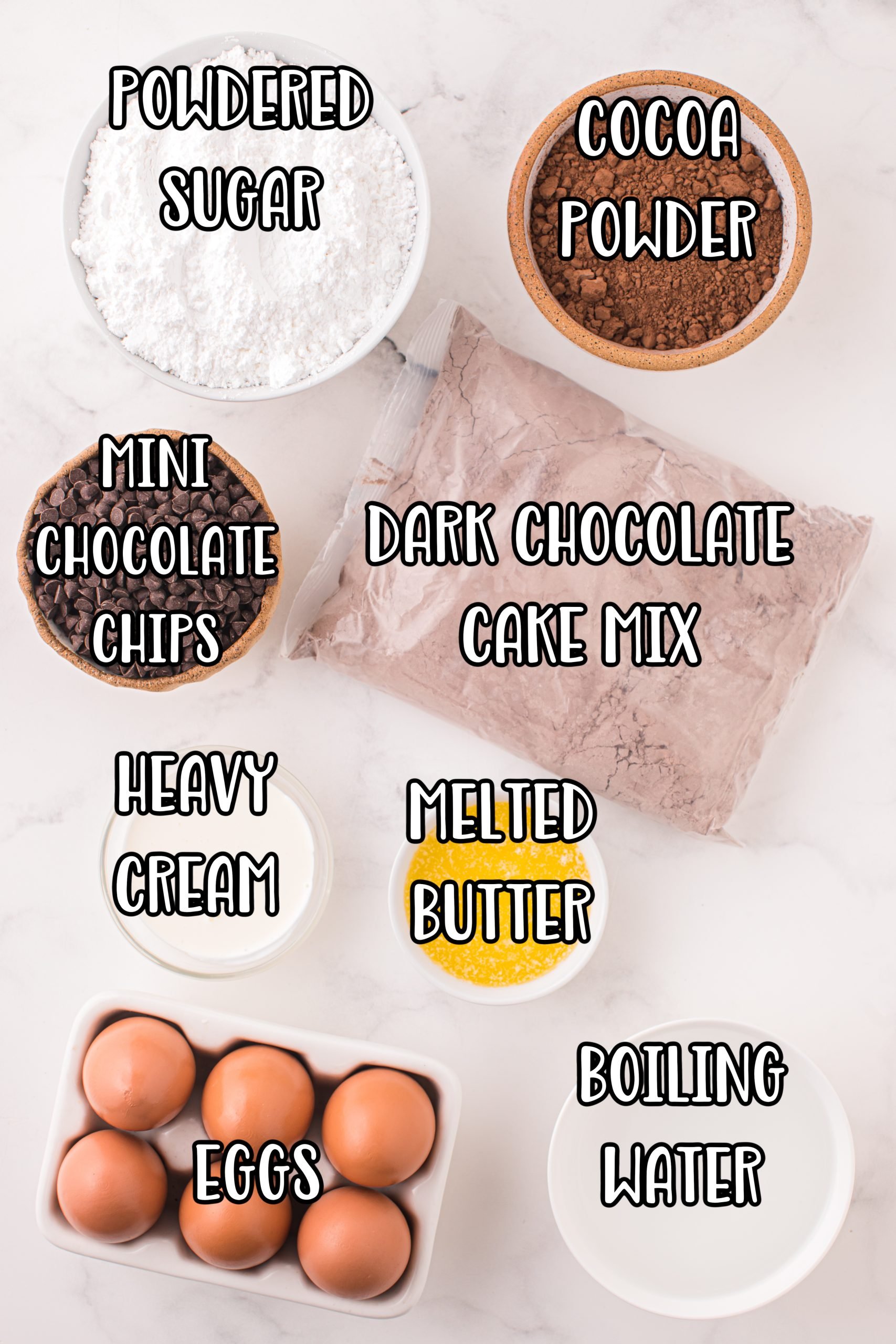 Powdered sugar, chocolate cake mix, cocoa powder, mini chocolate chips, heavy cream, melted butter, water, and eggs.