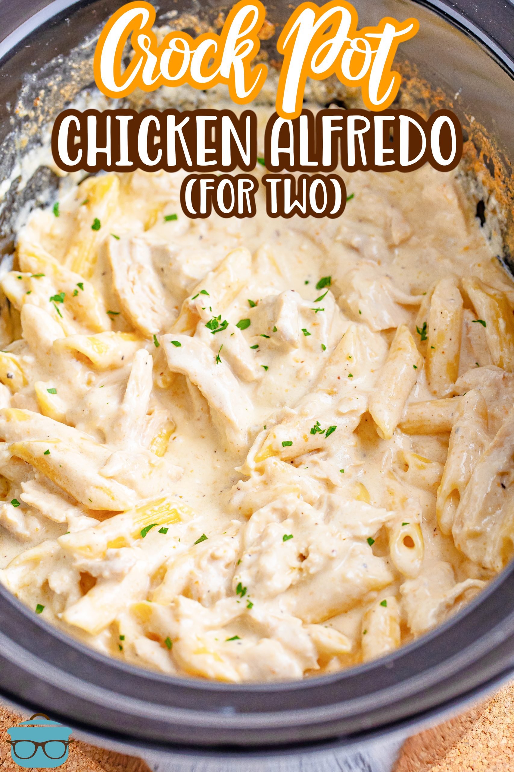 Looking down on a Crockpot with Chicken Alfredo for Two.