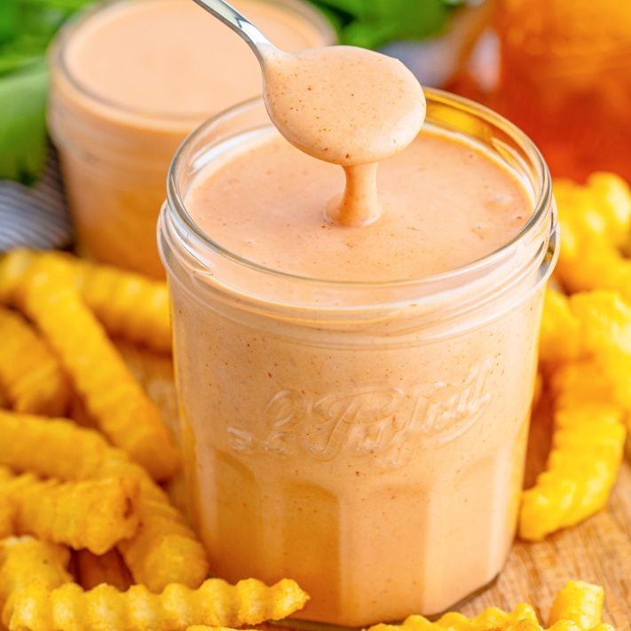 A jar with a spoon of Comeback Sauce.