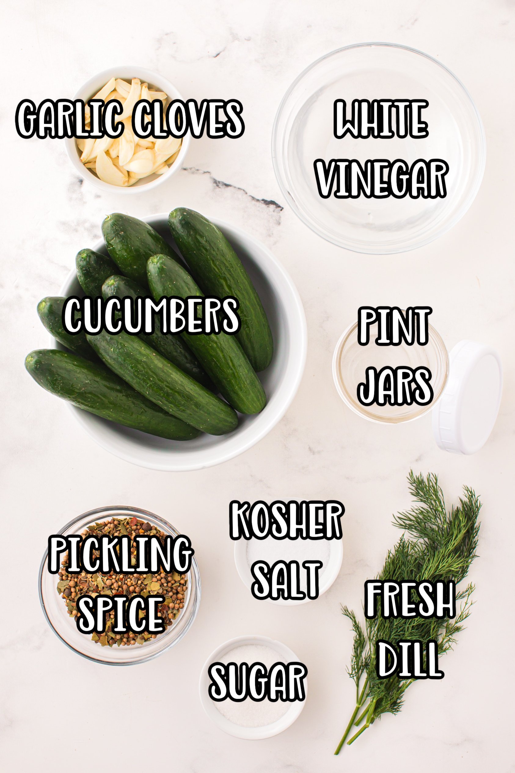 Cucumbers, water, sugar, white vinegar, fresh dill, fresh garlic, salt, and pickling spice.
