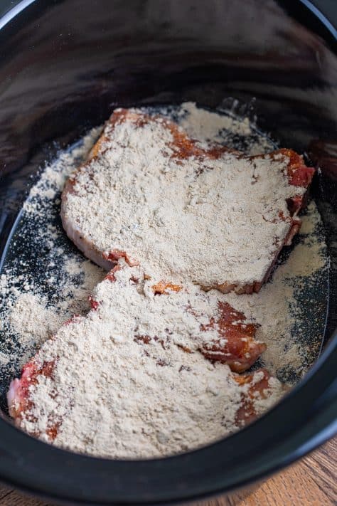 pork gravy mix sprinkled on top of pork chops.