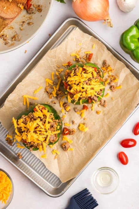 Cheese added to stuffed peppers.