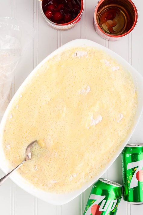 Cake mix with 7Up being mixed together.