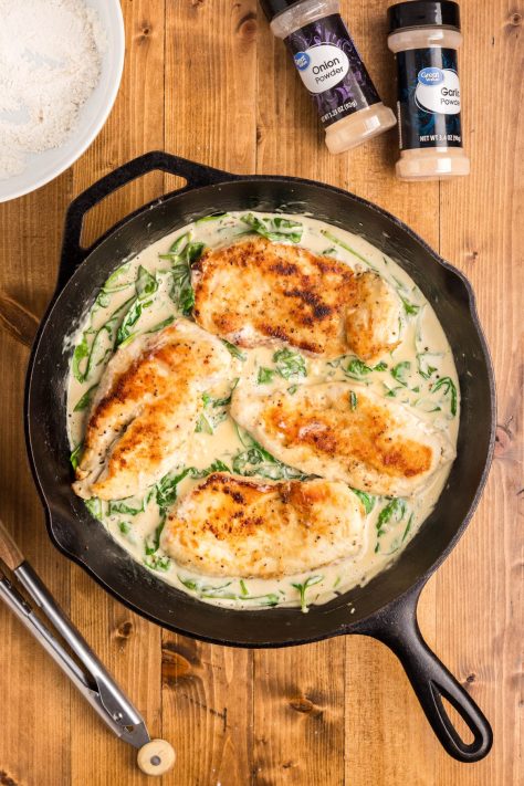 A skillet with Chicken Florentine.