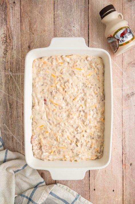 A baking dish with McGriddle Casserole batter.