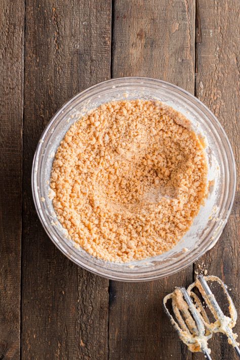 Cheese dough crumby mixture in a bowl.