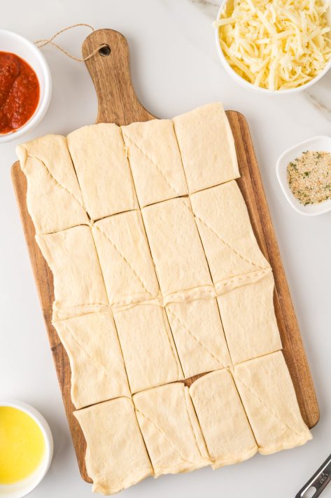 Crescent roll rolled out and cut into rectangles.