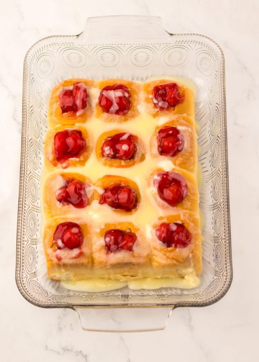 Cherry pie filling and cream cheese filling inside Hawaiian rolls.