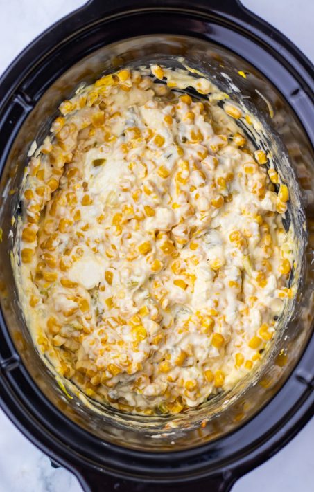 The start of Corn Dip being stirred in a Slow Cooker.