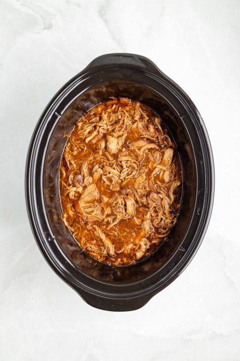 Slow Cooker Honey Garlic Chicken still in the Crock insert.