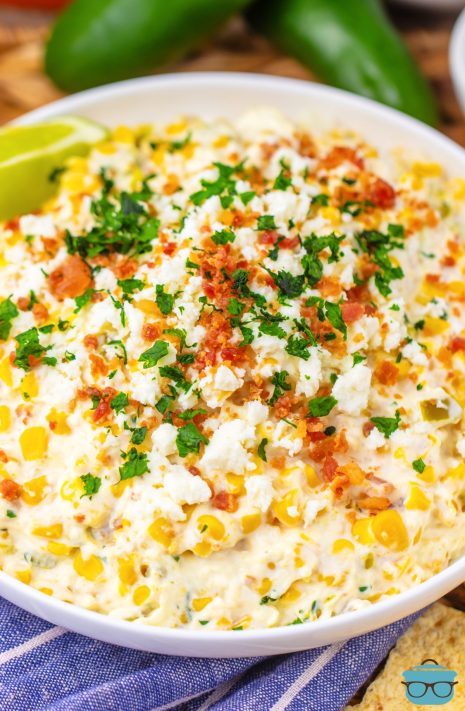 A big white bowl of Slow Cooker Corn Dip.