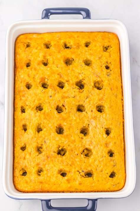 A cake with holes poked in it.