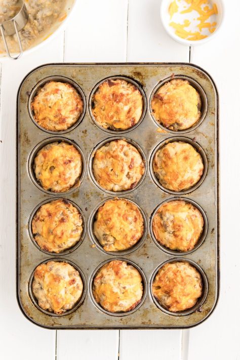Cooked McGriddle Muffins in a muffin tin.