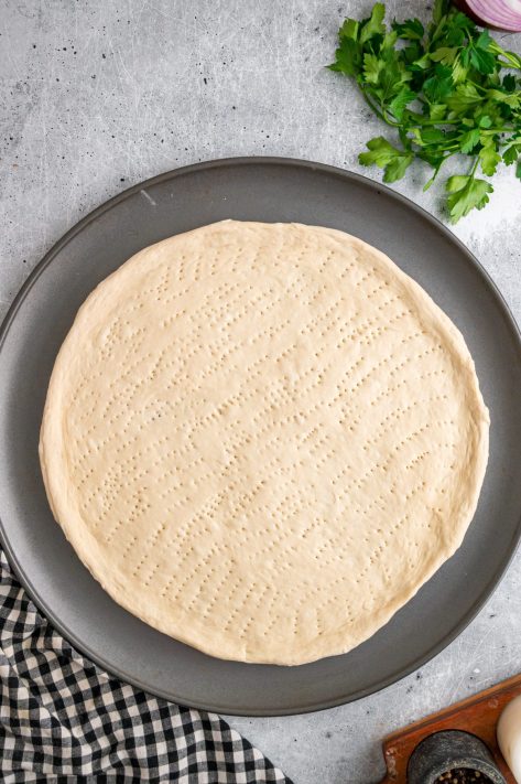 Dough being rolled out.