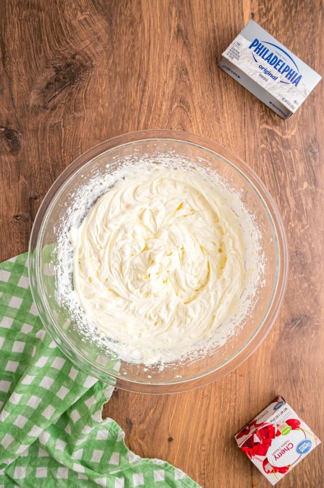 Frosting being made in a bowl.