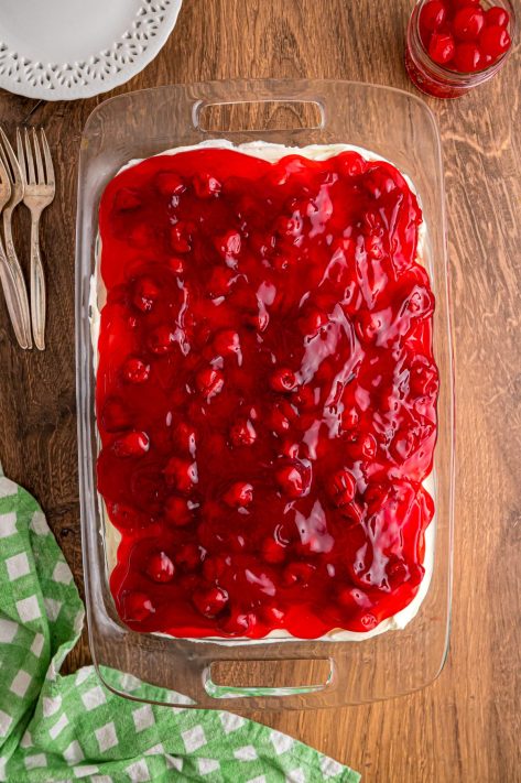 A frosted Cherry Poke Cake.