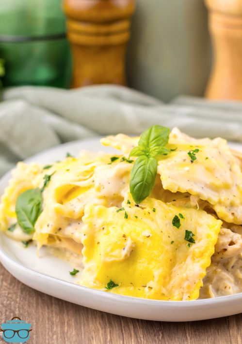 Close up on a plate of Crock Pot Chicken Alfredo Ravioli.
