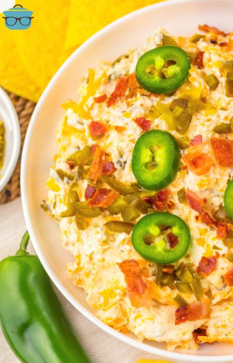 Looking down on part of a bowl full of Slow Cooker Jalapeno Popper Dip.