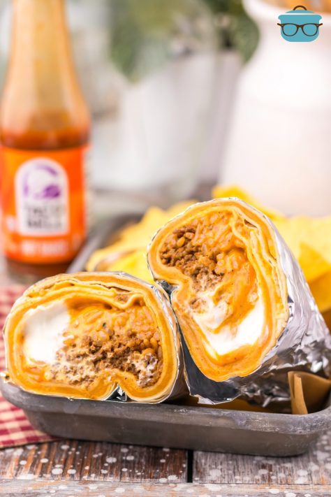 A cut open copycat Taco Bell Quesarito on a plate.