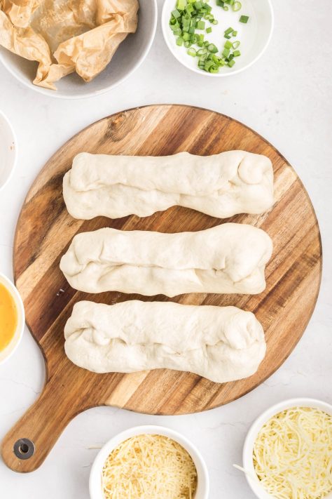 Rolled up, unbaked chicken bakes.