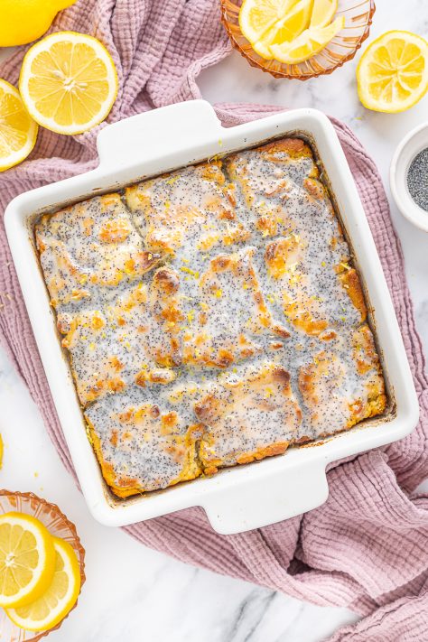 Glazed Lemon Poppy Seed Butter Swim Biscuits in a baking dish.