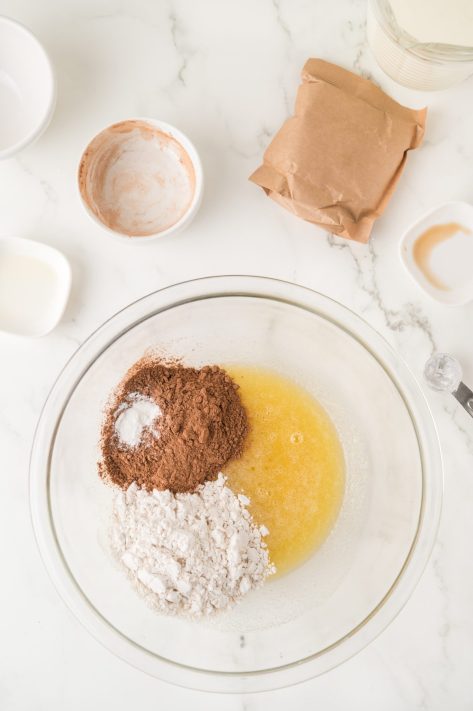 Brownie mix being mixed together in a bowl.