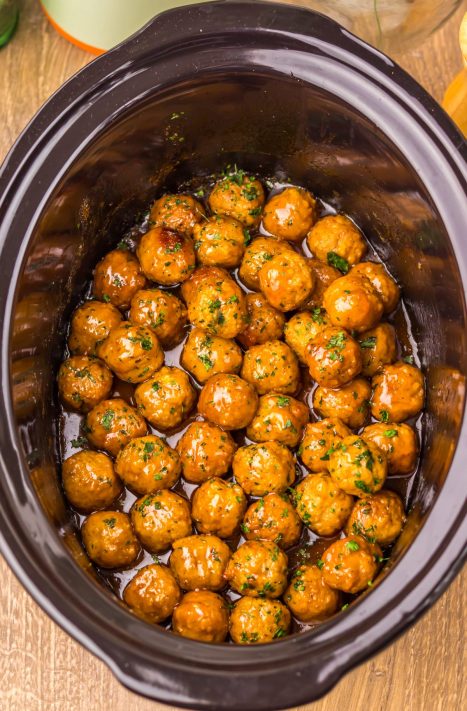 Slow Cooker Root Beer Meatballs cooking.