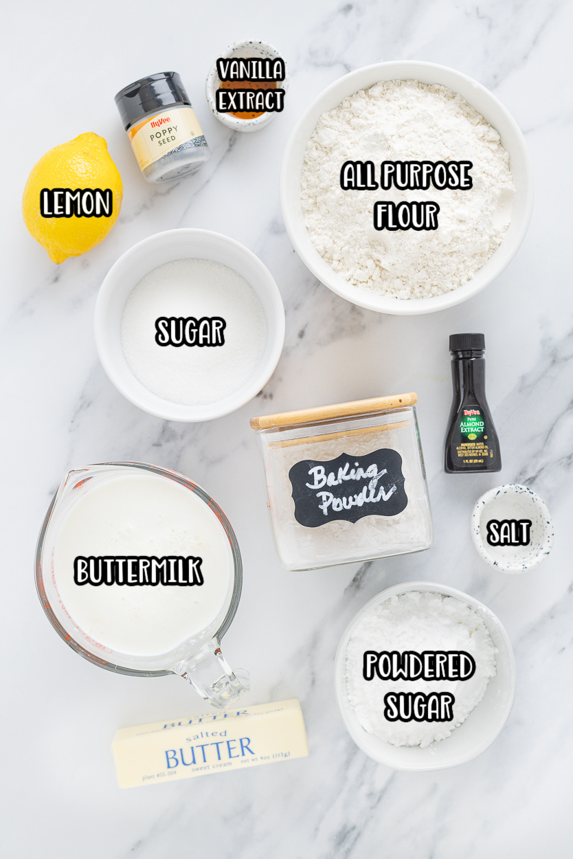 All-purpose flour, baking powder, salt, granulated sugar, fresh lemon zest, poppy seeds, buttermilk, melted butter, and vanilla extract for the biscuits, plus powdered sugar, fresh lemon juice, almond extract or vanilla, and salt.