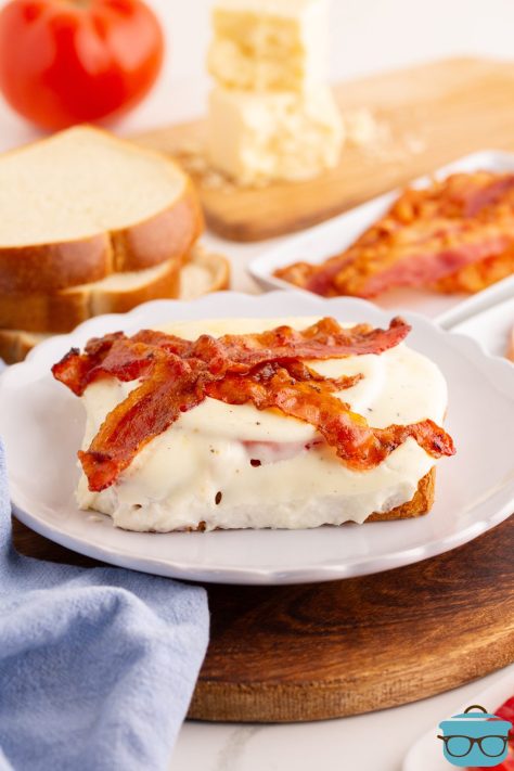 A plate with an open faced Kentucky Hot Brown.