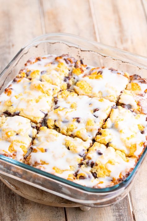 Glazed Chocolate Chip Butter Swim Biscuits in a pan.