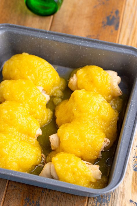 Butter mixture on top of crescent roll dough.
