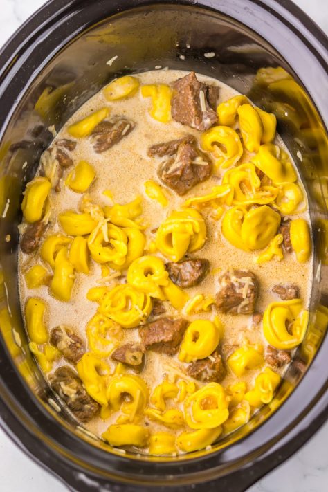 Cheesy tortellini and Steak Bites in a Crock Pot.