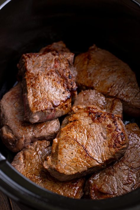 Seared steaks in a Slow Cooker.