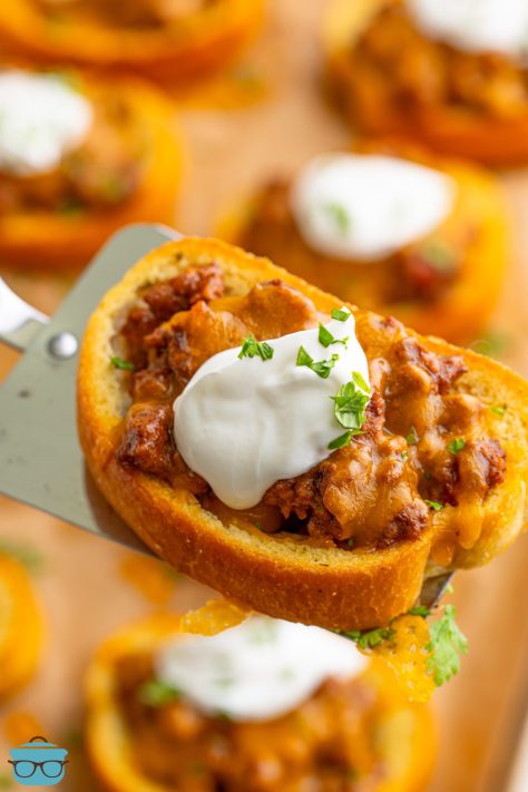 A few Taco Texas Toast pieces on a lined baking tray.