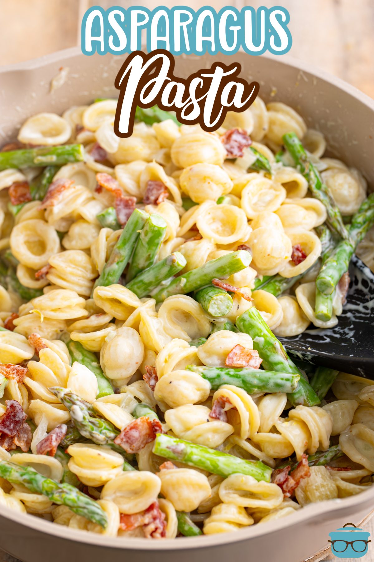 A large serving bowl of Asparagus Pasta.